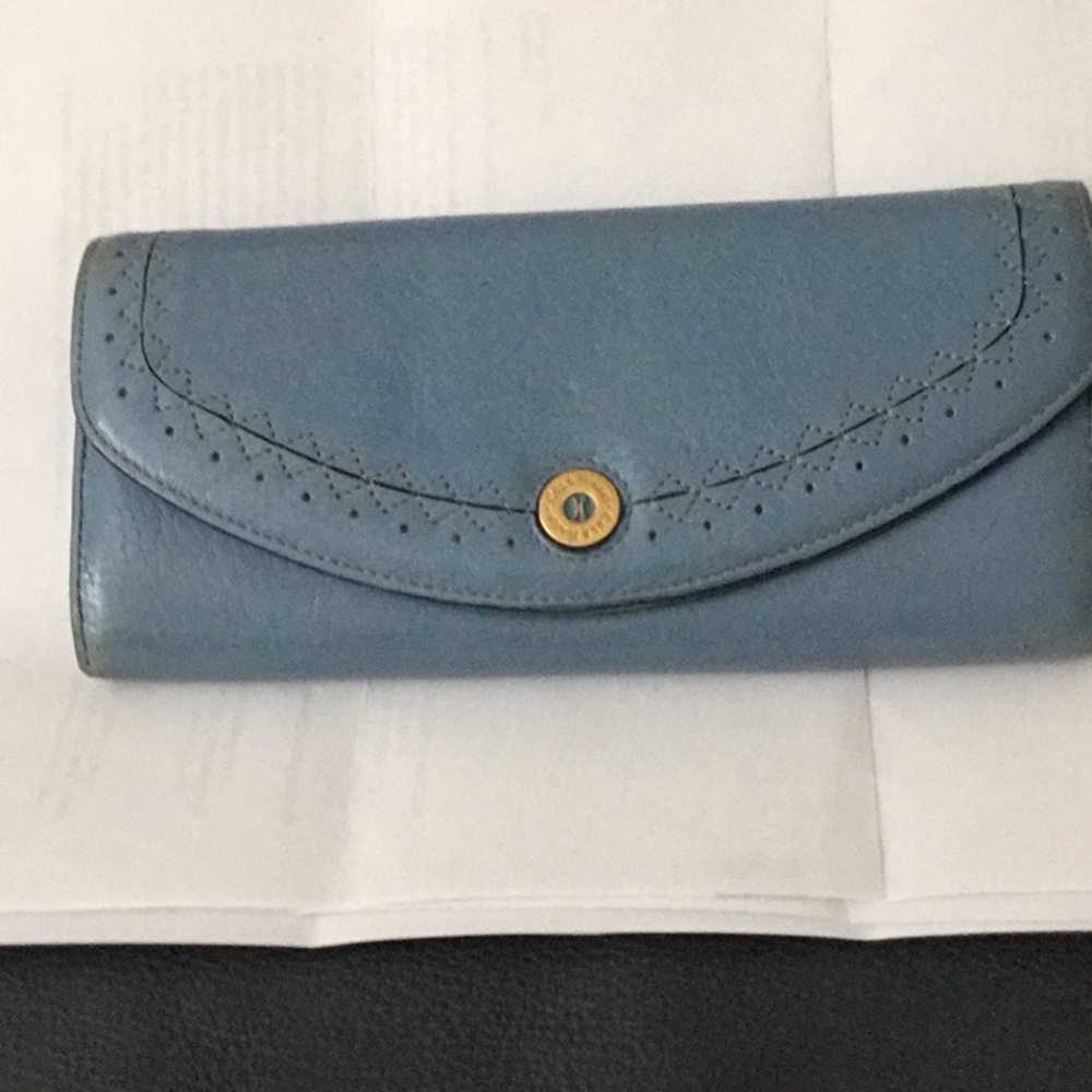 Cole Haan leather wallet beautiful blue. 8” x4”. 12 enclosure areas inside.